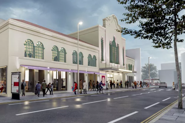 A mock-up of Soho Theatre Walthamstow, showing white building facade against a blue sky