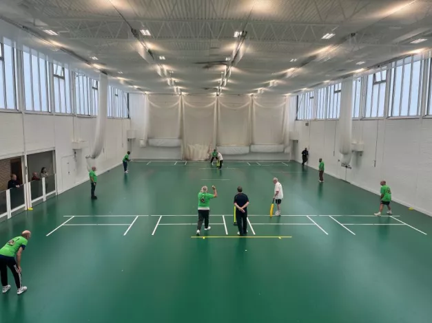 People playing walking cricket