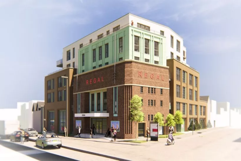 A CGI of the Regal Cinema, a building with trees and people